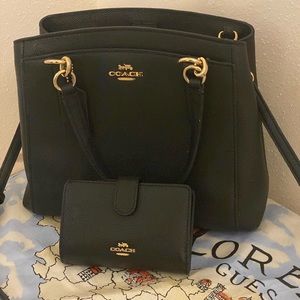 Black coach purse with matching wallet